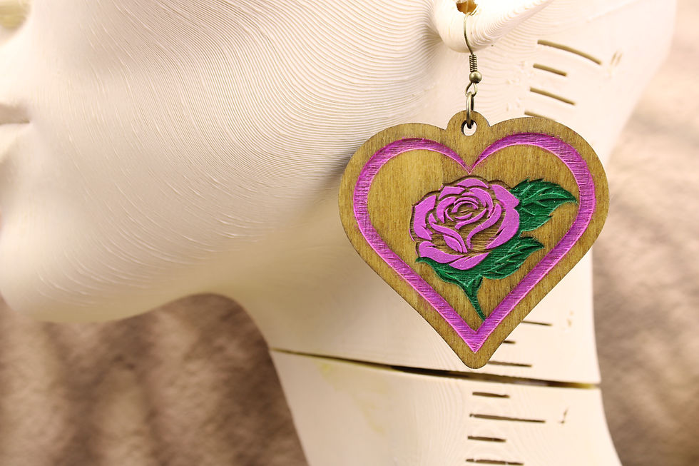 GTC397 Pink Rose Heart Frame earring on a mannequin