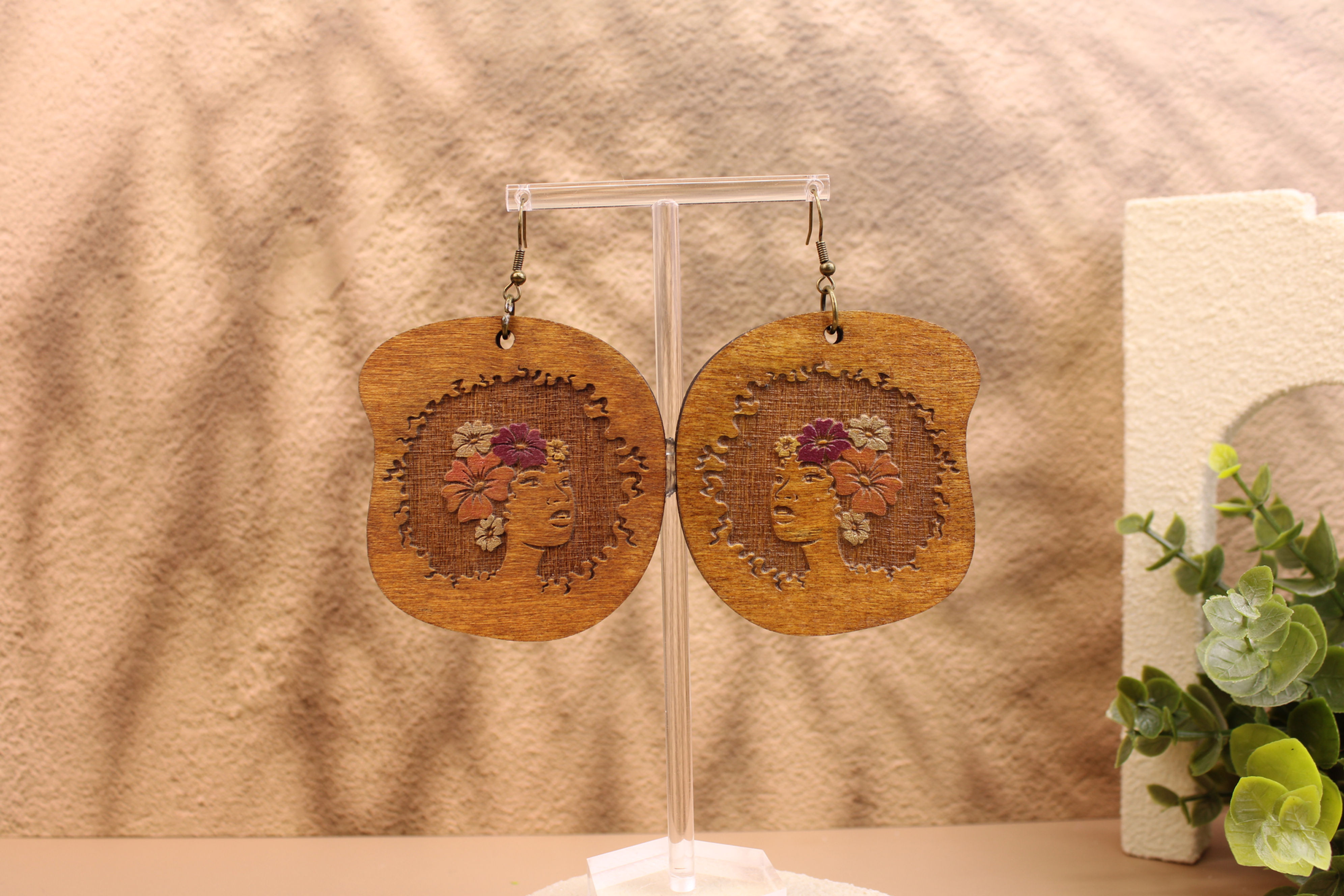 The Blooming Beauty GTC048 earrings on a stand