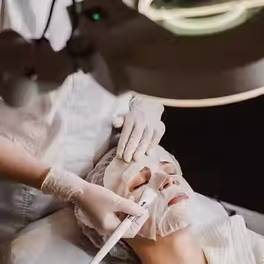young-woman-getting-skin-mask-treatment_23-2148825369.avif
