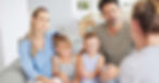 Family sitting on couch