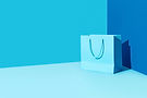 paper-shopping-bag-blue-background.jpg