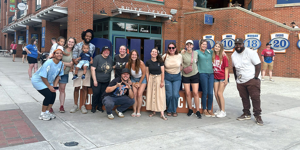 Heart & Home Connections team and family gathering at a sporting event