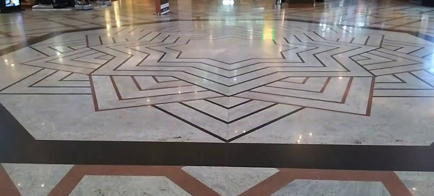 Full granite flooring at the mall with different design pattern using wide variety of colour combination in flooring