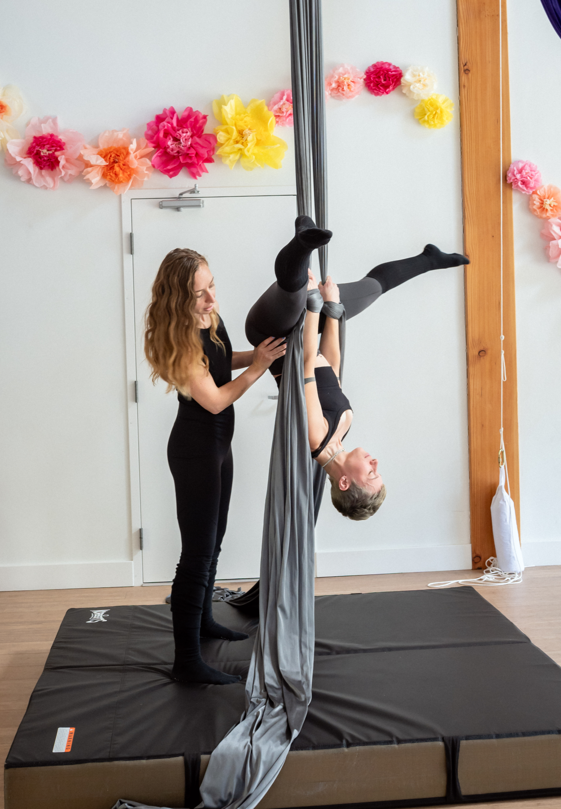 Hands-on spotting practice during aerial teacher training