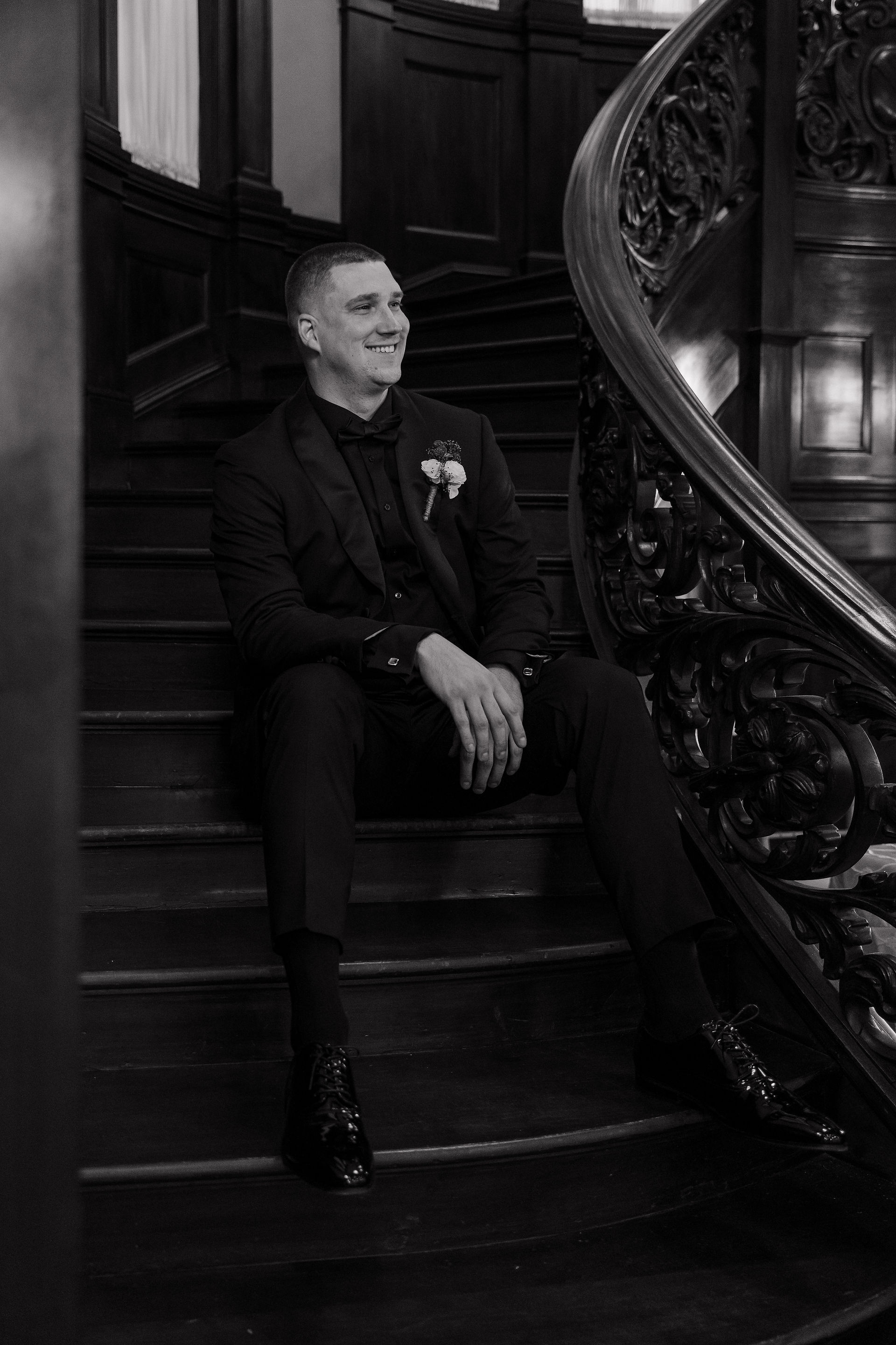 black and white photo of groom
