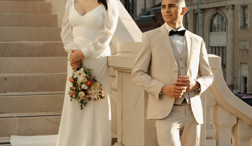 Bride and Groom Standing in the city