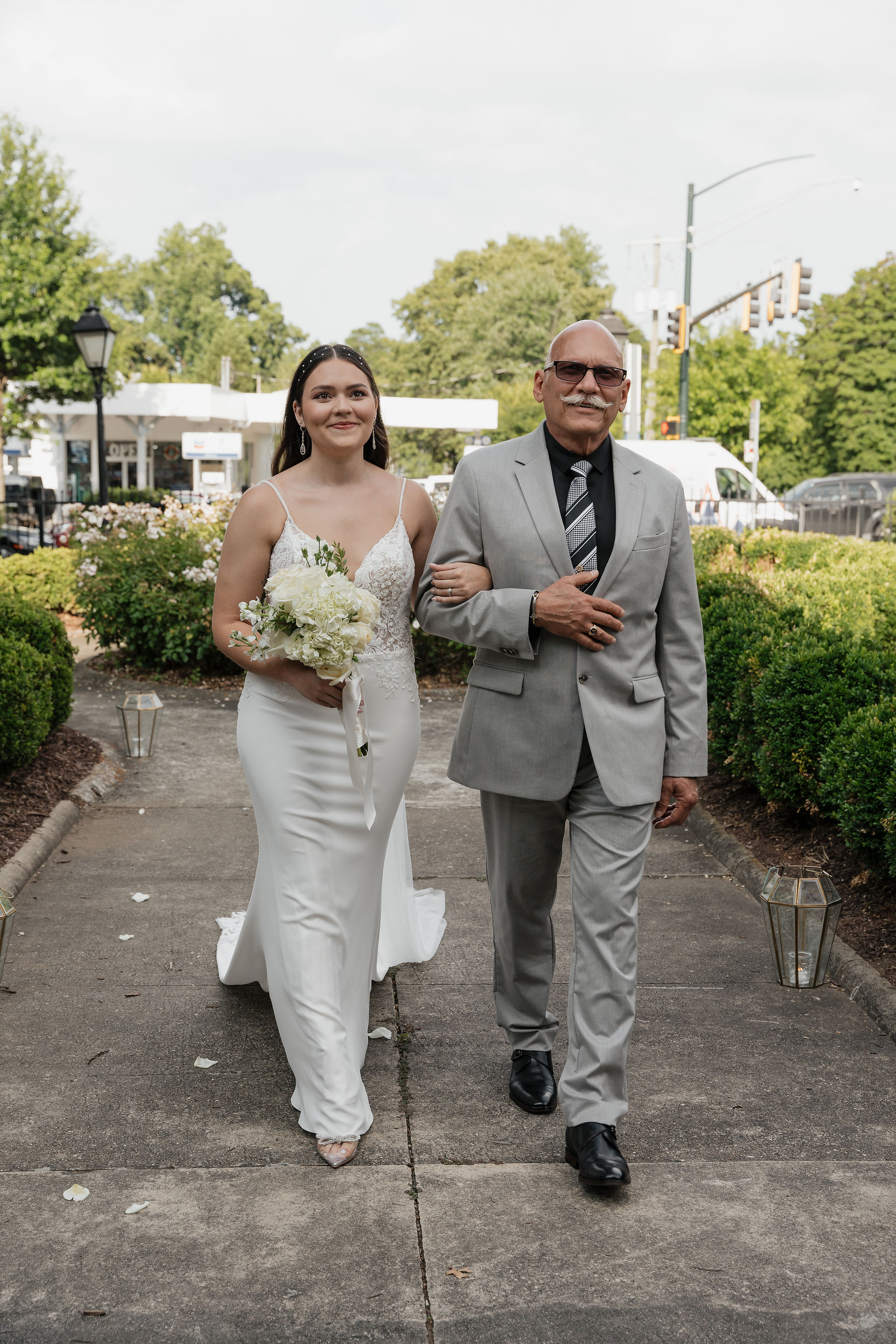 daddy daughter walking in for the ceremony 