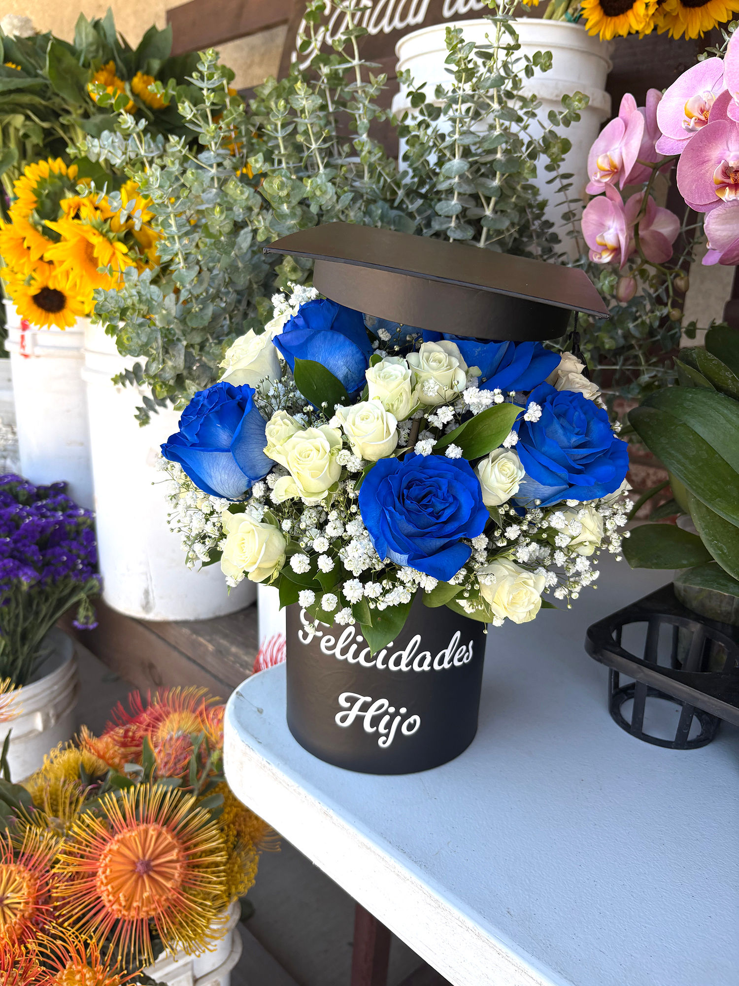#399 Blue & White Grad Arrangement