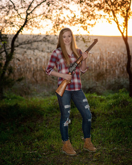 teen hunter posing at sunset in Gretna, Ne