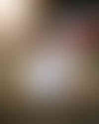 High school senior drinking Fanta soda with leaves falling around him. 