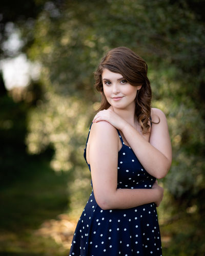 High School girl dressed as a classic pin up girl for Senior photos.