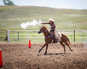 Mounted Cowboy and Cowgirl shootout in Ravenna, Nebraska from certified photographer EMDukat Photography.