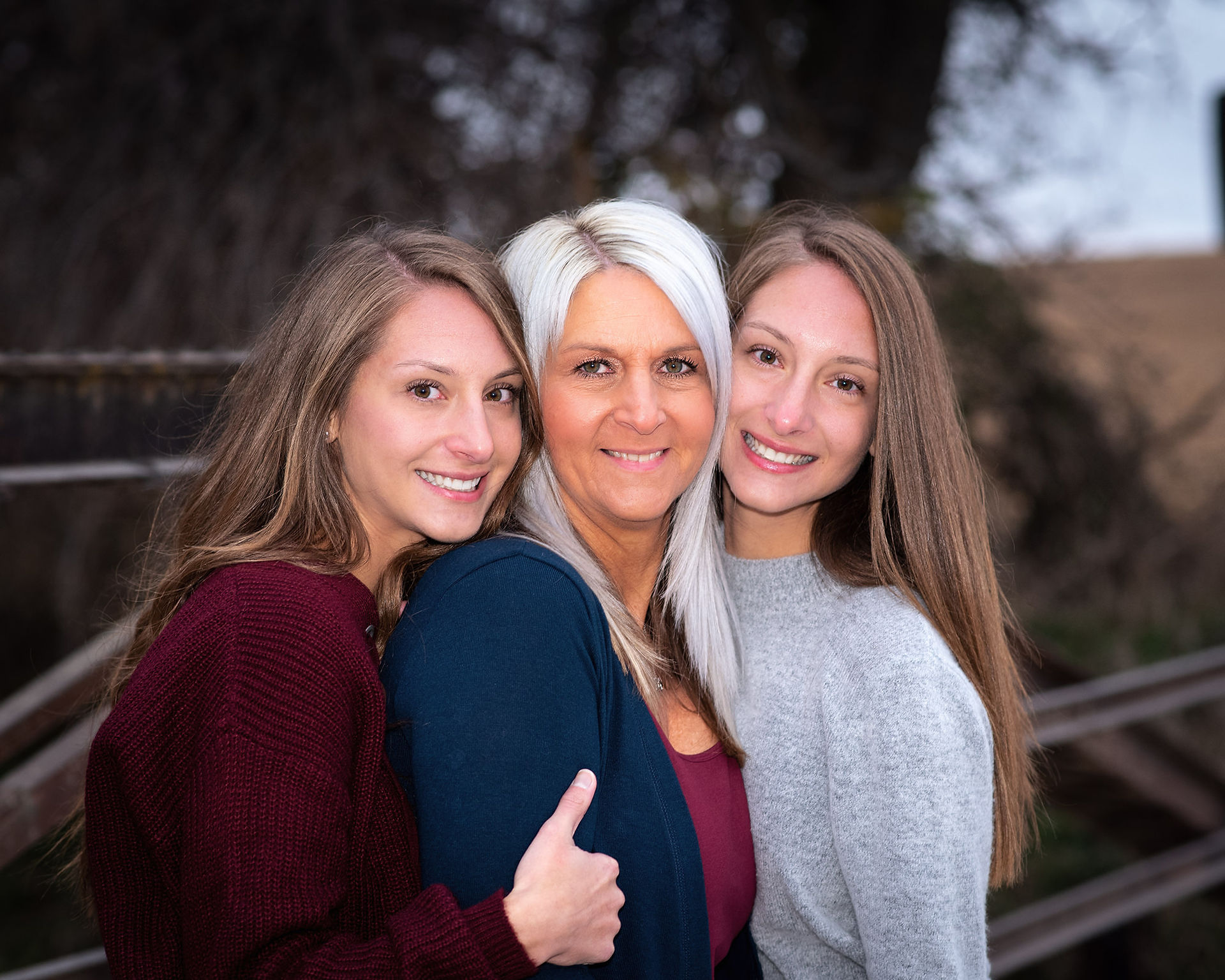 girls hugging mama during photos with EMDukat Photography