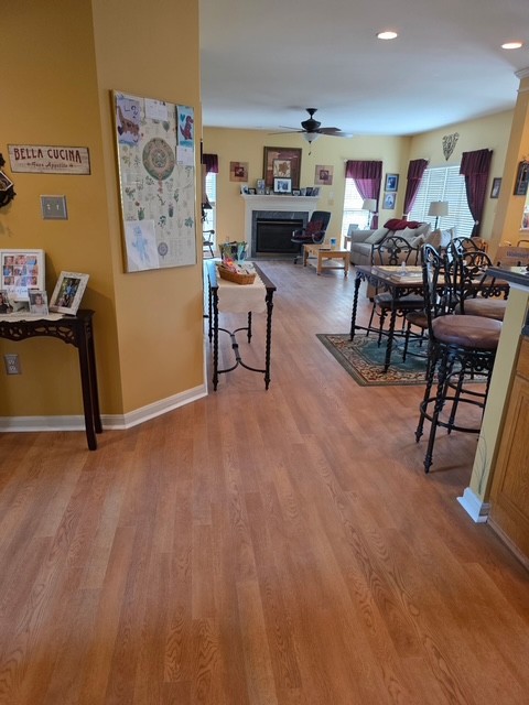 Wood flooring across an open-plan living area