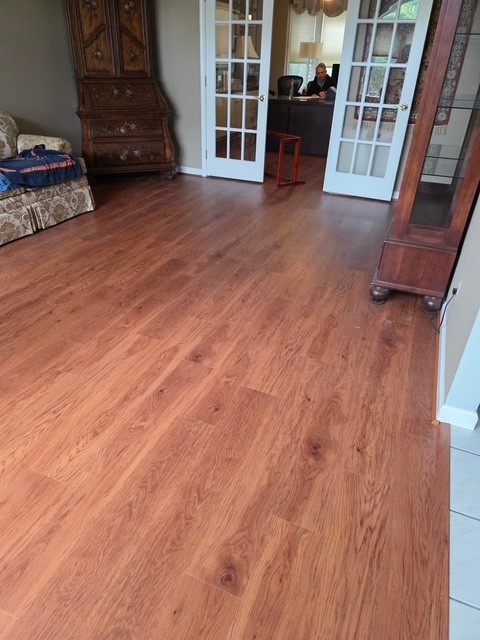 Finished wood-look flooring in a furnished room