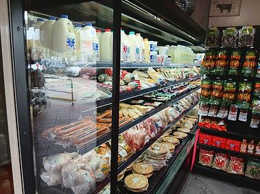 Multideck display fridge stocked at Wavell Heights Gourmet Meats, inner-north Brisbane