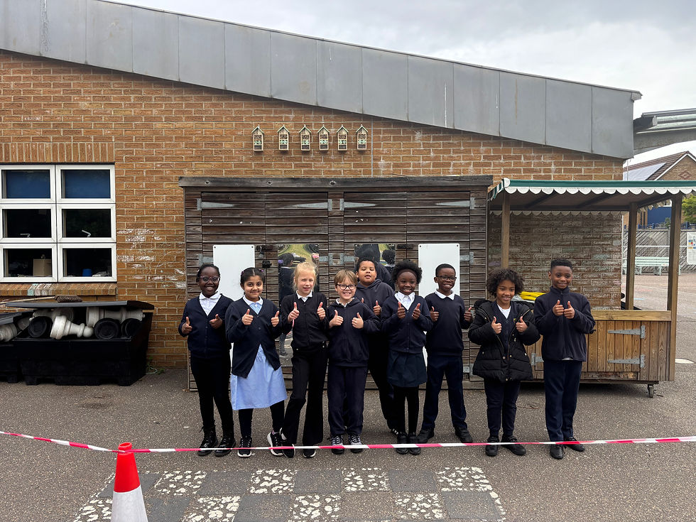 Pupils in front of bee hotels