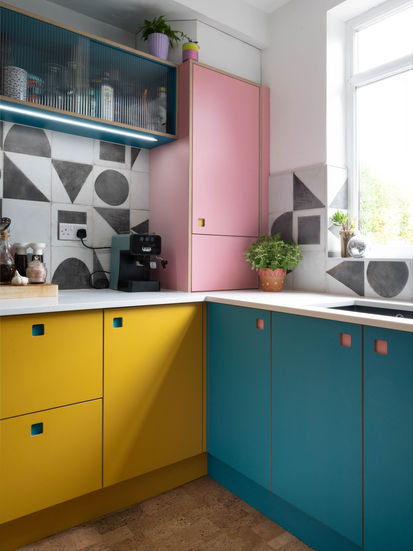 Plywood kitchen with quartz work top and black and white tiles