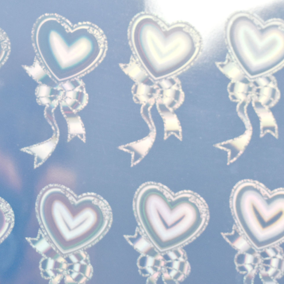 Thumbnail: A4 Holographic Silver Sticker Vinyl Label with heart designs.