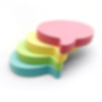 Two stacks of colourful speech bubble-shaped sticky notes featuring the colours pink, yellow , green and blue.