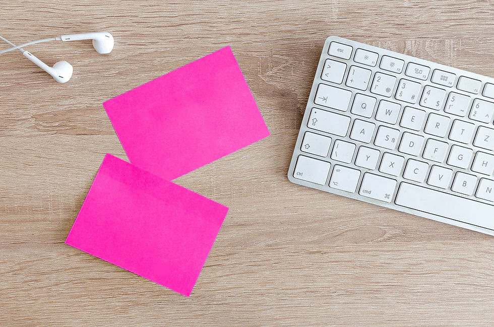 Thumbnail: Two neon sticky notes stuck on an office wooden table next to a white keyboard.