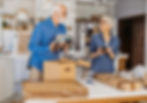 senior couple decluttering before their downsizing move