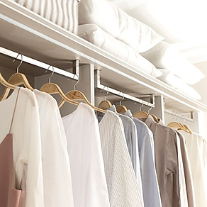 organised wardrobe clothes storage