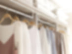 Rail of clothes with matching hangers