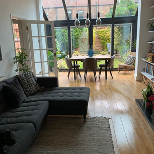 tidy back room with table and chairs