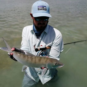 Man holding up a fish