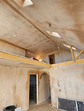 Newly plastered interior walls of new build