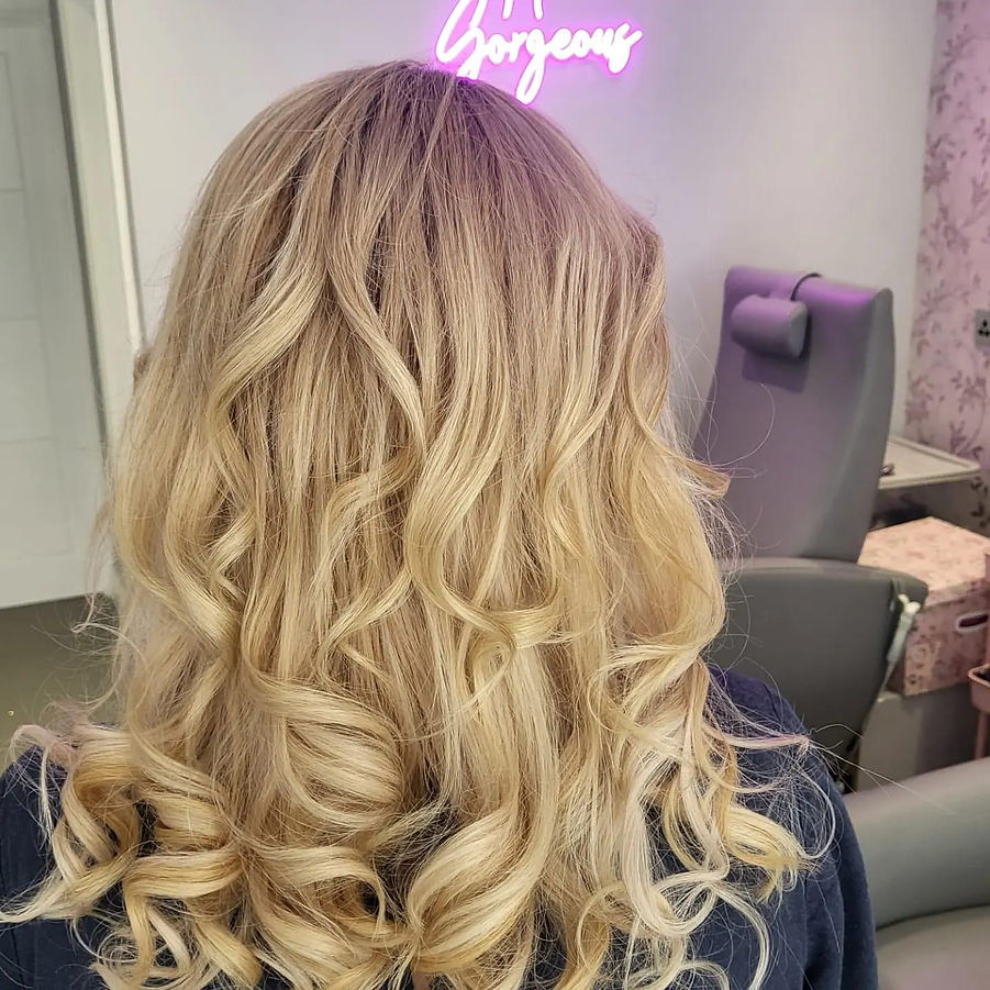 Curly long blonde hair on a woman