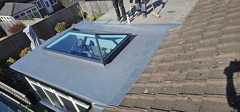 Modern flat roof extension with glass skylight lantern feature fitted