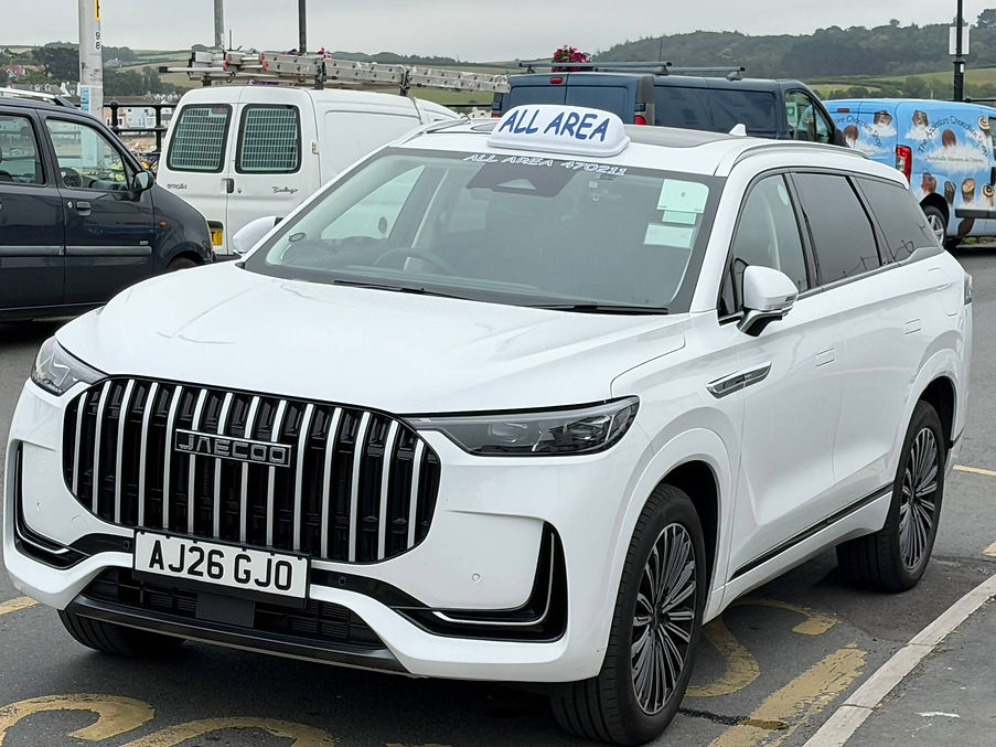 Front view of large white vehicle