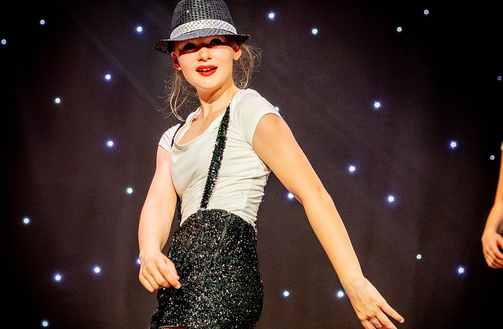 Young actor wearing tap dancing costume in a theatre play