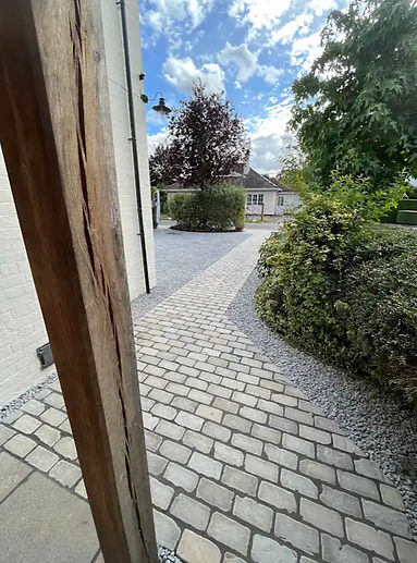 Stone pathway by the side of a house