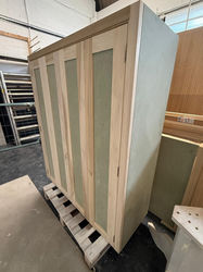 Wooden wardrobe with three vertical panels