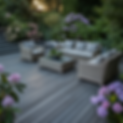 Premium composite deck with luxury outdoor furniture and rhododendron border creating elegant entertaining space