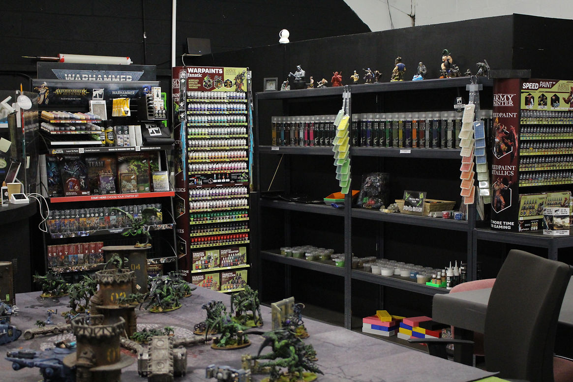 Store room displaying figurine painting tools for hobbyists