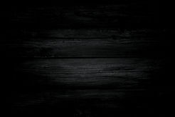 rustic-black-wooden-background-with-copy-space_edited.jpg