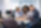 young-couple-buying-a-car-in-a-car-showroom.jpg