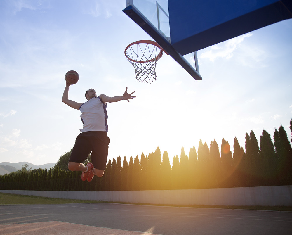 basketball player dunking