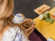 Participant enjoying ceremonial cacao during a guided psilocybin retreat