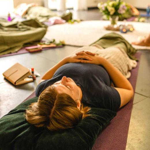Participant preparing for a guided psilocybin retreat in a structured retreat setting