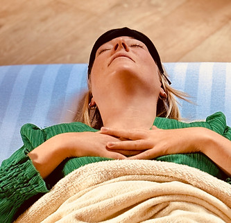 woman lying in psilocybin ceremony