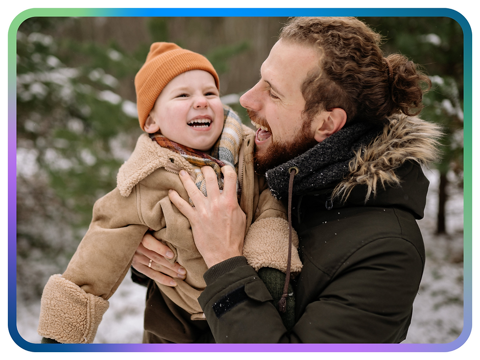 An image of a father and son enjoying the snow, representing how parents can help prepare medically fragile children for cold weather conditions.