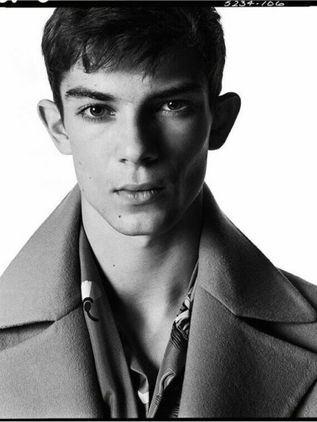 Matthieu, top male model from Men Model Mgmt Paris, featured in prestigious Valentino campaign | Professional black and white portrait showcasing strong jawline and high fashion styling.