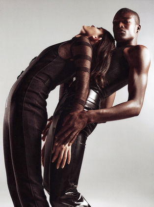 Sensual embrace, models in black leather