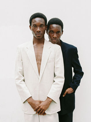 Two male models in suits, fashion portrait