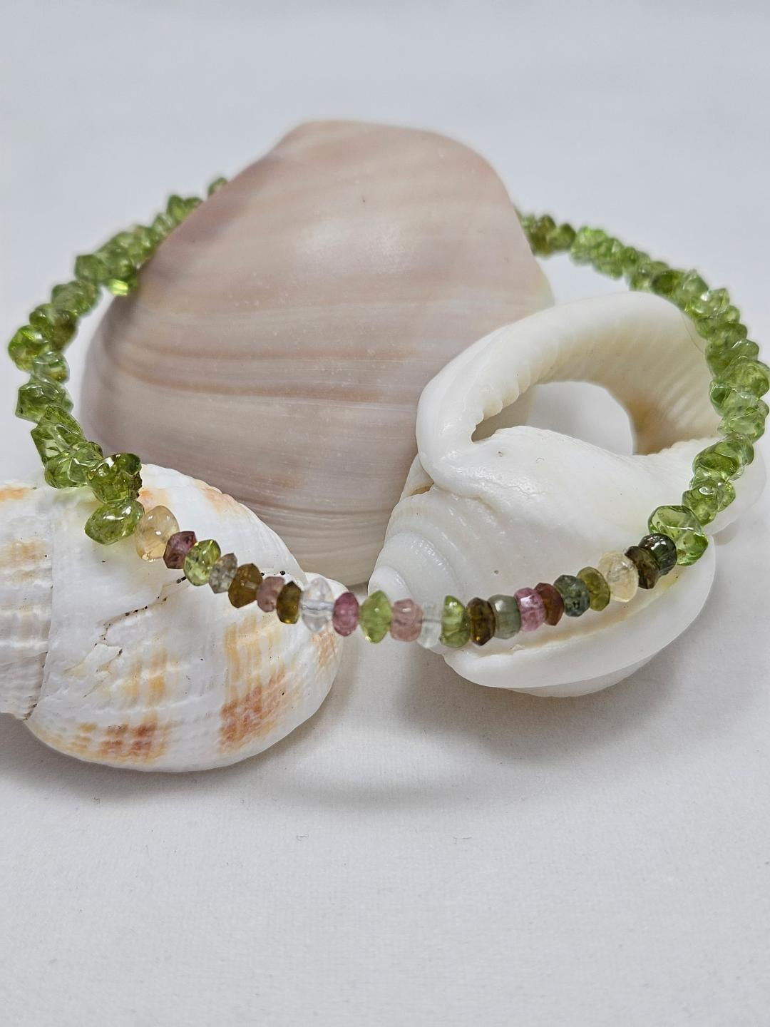 Peridot chips with multi color Tourmaline rondell.